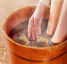 Load image into Gallery viewer, Prepare the Soak Fill a basin with warm water, adjusting the temperature to your liking. Add 3-5 tea bags, allowing their essence to infuse the water with their therapeutic properties. Watch as the water takes on a rich, soothing hue, inviting you to step in.
